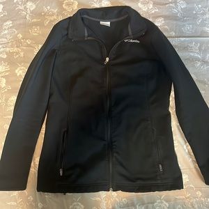 Black Columbia zip up jacket. Used condition. Size adult large
